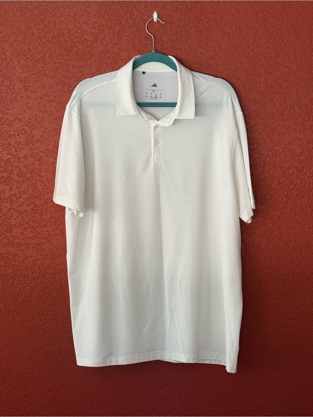 Men's Adidas white polo size XL. Excellent condition.  (I have 3 identical ones)
